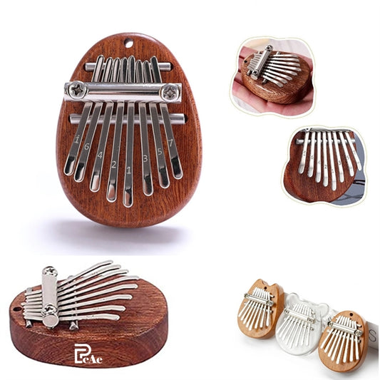 8 Keys Thumb Portable Piano