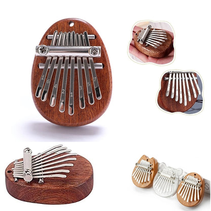 8 Keys Thumb Portable Piano