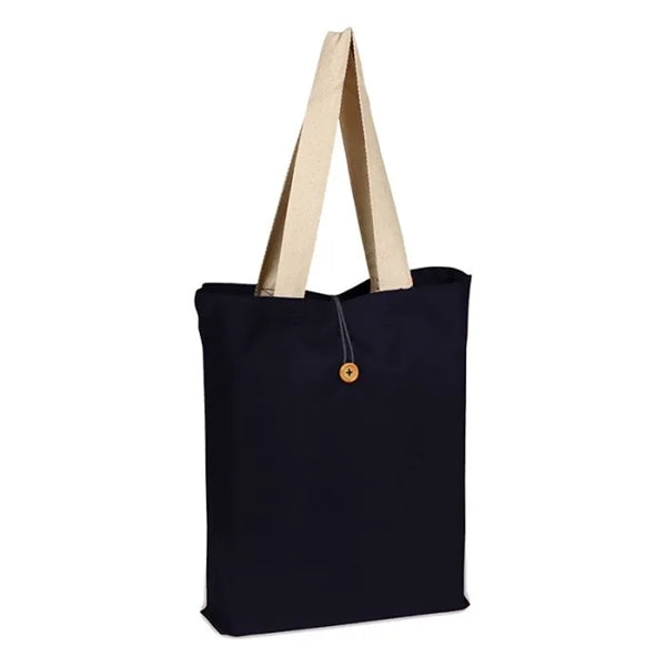 Fashion tote with cotton webbed handles and buttoned closure