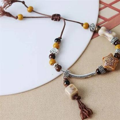 Handmade Ceramic Bead Bracelet with Geometric Design and Tas