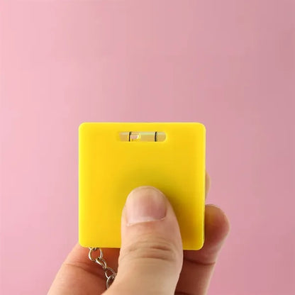 Compact Retractable Tape Measure with Level