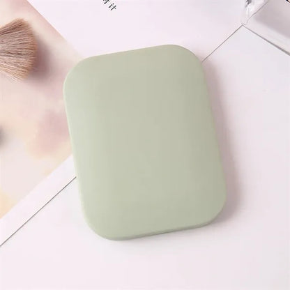 Compact Travel Mirror with Comb