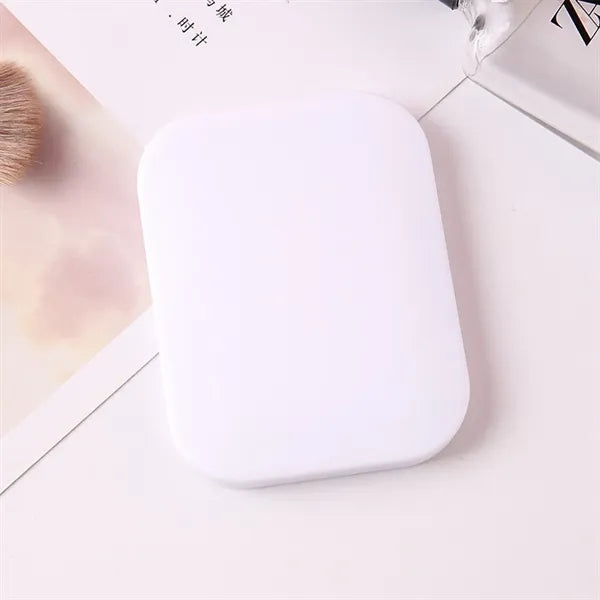 Compact Travel Mirror with Comb