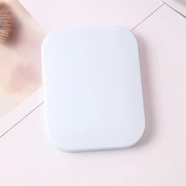 Compact Travel Mirror with Comb