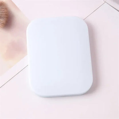 Compact Travel Mirror with Comb