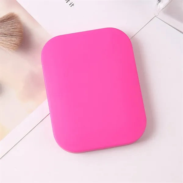 Compact Travel Mirror with Comb