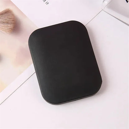 Compact Travel Mirror with Comb