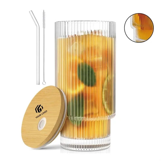 Clear cocktail glasses with lids and straws