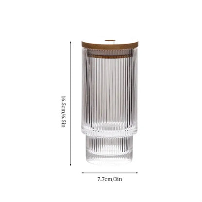 Clear cocktail glasses with lids and straws