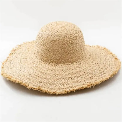 Wide brimmed raffia straw hat