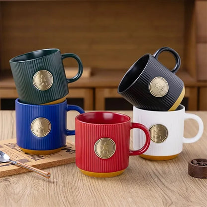 Premium Ceramic Cups with Metal Badge Decoration