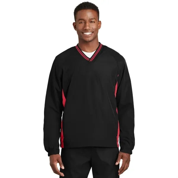 Sport-Tek Tipped V-Neck Raglan Wind Shirt.