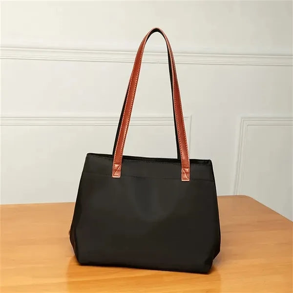 Nylon shoulder tote bag with leather straps