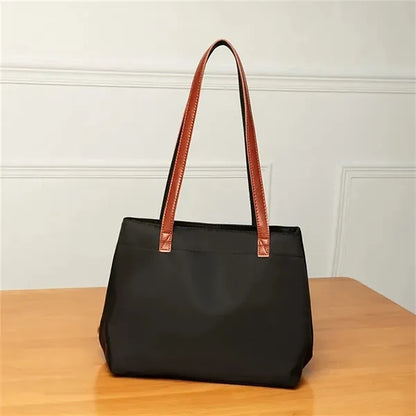 Nylon shoulder tote bag with leather straps