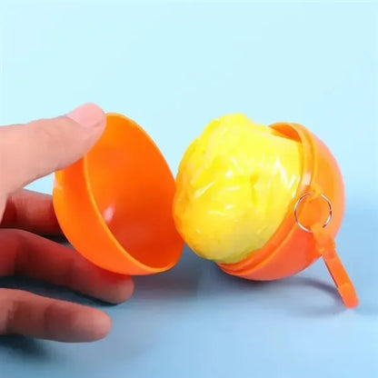 Disposable Rain Poncho in Ball Keychain