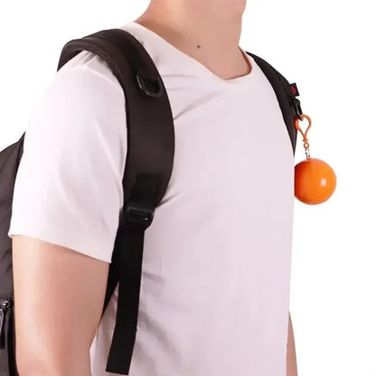 Disposable Rain Poncho in Ball Keychain
