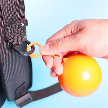 Disposable Rain Poncho in Ball Keychain