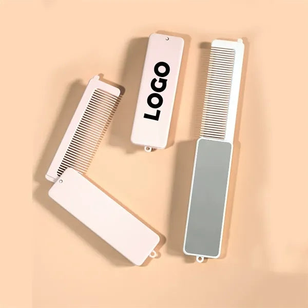 Dual Function Folding Mirror With Integrated Comb