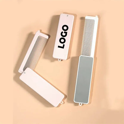 Dual Function Folding Mirror With Integrated Comb