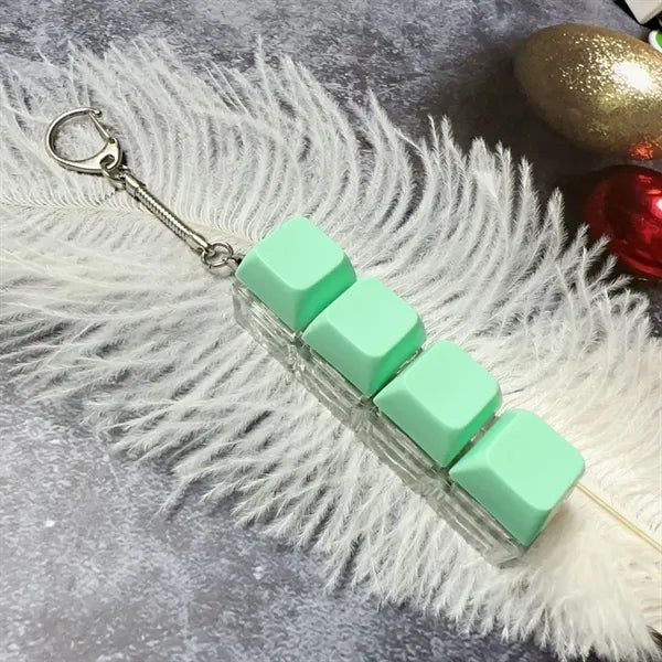 Single Row Four Button Decompression Toy Keychain With Light