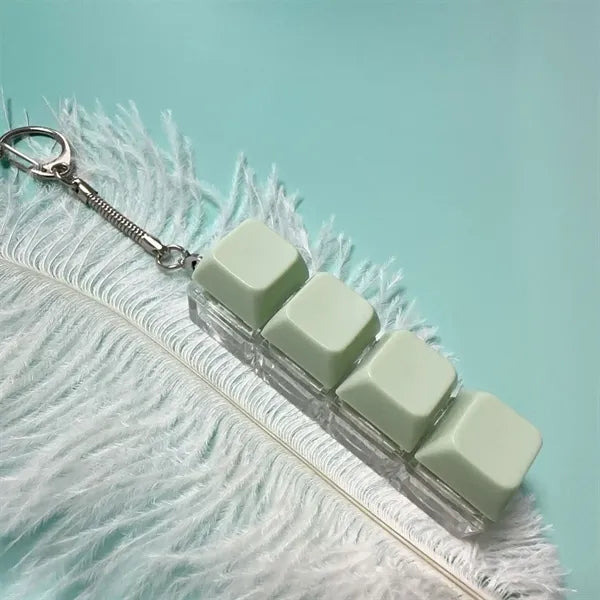 Single Row Four Button Decompression Toy Keychain With Light