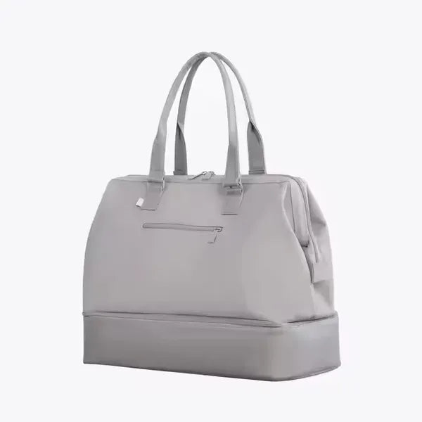 The Weekender Mini Travel Bag With Drop Bottom
