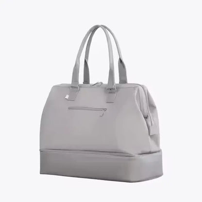 The Weekender Mini Travel Bag With Drop Bottom