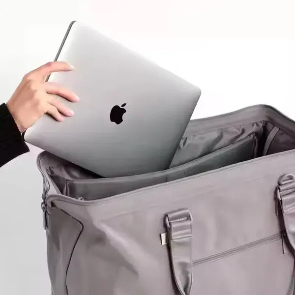 The Weekender Mini Travel Bag With Drop Bottom