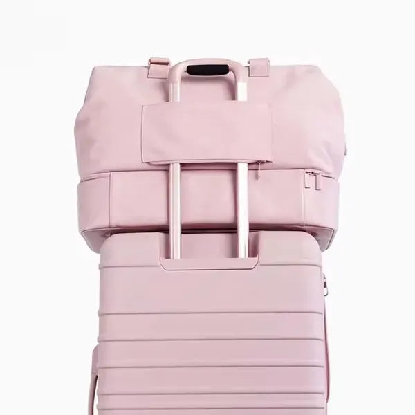 The Weekender Mini Travel Bag With Drop Bottom
