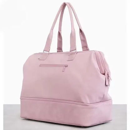 The Weekender Mini Travel Bag With Drop Bottom