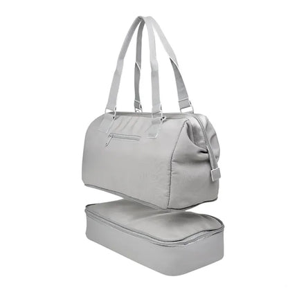 The Weekender Mini Travel Bag With Drop Bottom
