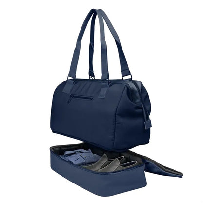 The Weekender Mini Travel Bag With Drop Bottom