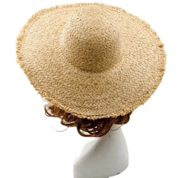 Wide brimmed raffia straw hat