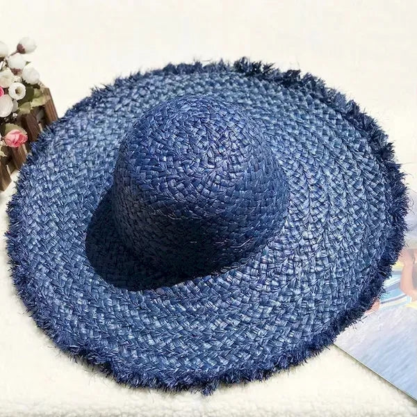 Wide brimmed raffia straw hat