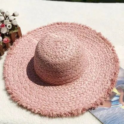 Wide brimmed raffia straw hat