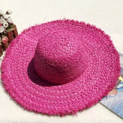Wide brimmed raffia straw hat