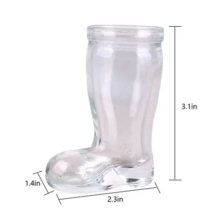 Small boots in a glass bottle with a cork