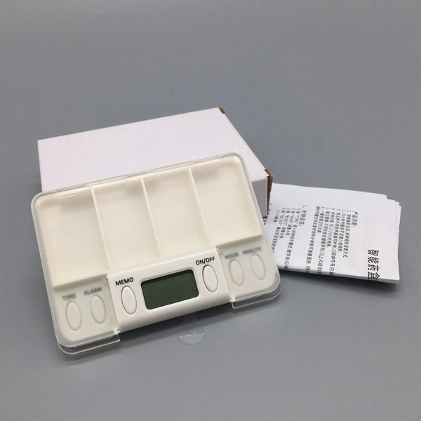 Pill box with alarm clock